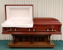Deep reds, as found with cherry and mahogany, exhibit the natural elegance and style of a wooden casket.